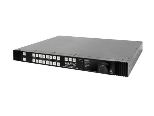 Lightware video matrix switcher – black, rack-mountable unit featuring multiple white square input and output buttons, a digital display screen, and a control knob on the front panel for professional AV signal management.