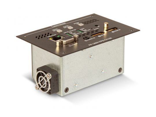 Rectangular industrial electronic device with metallic enclosure, featuring ports, vents, and indicator lights on the top panel, plus a cooling fan on the side—ideal for industrial automation or control systems.