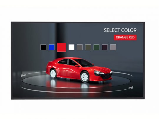 Digital display screen showing a red car with a color selection menu above it, highlighting Orange Red as the selected shade. Arrows around the car suggest 360-degree rotation for viewing different angles.