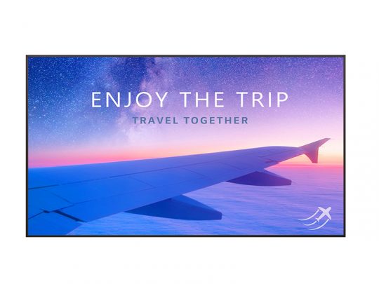 View from an airplane window showing a white airplane wing against a vibrant sunset sky with hues of orange, pink, and blue. The text Enjoy the Trip, Travel Together is overlaid on the image, promoting travel and adventure. Perfect for travel advertisements or airline campaigns.