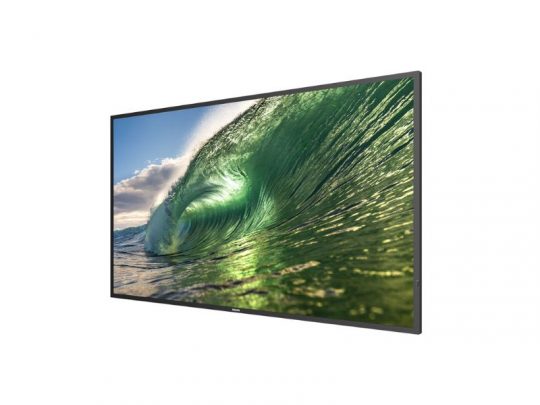 Flat-screen TV displaying a vivid ocean wave under a partly cloudy sky, shown from an angled side view on a plain white background. Modern television with slim bezels, ideal for home entertainment.