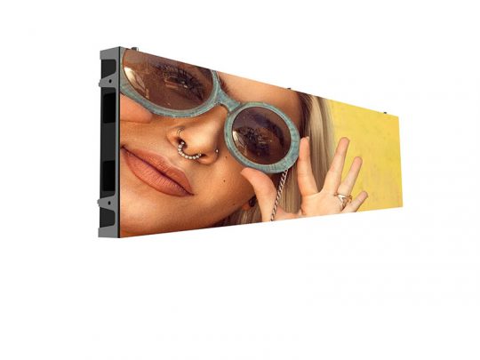 Rectangular LED display screen showing a close-up image of a person wearing round sunglasses and a nose ring, holding up their hands with fingers spread against a bright yellow background. Ideal for digital signage, advertising displays, or indoor visual promotions.