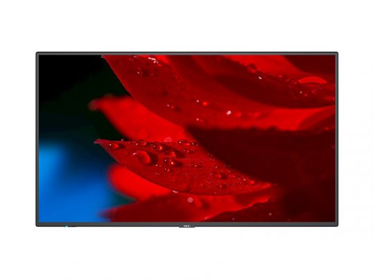 Flat-screen television, possibly a 4K Smart TV, displaying a vivid close-up of bright red flower petals with water droplets against a dark background with traces of blue.