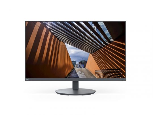 NEC flat-screen computer monitor showing an architectural walkway with bright orange walls and overhead beams creating striped shadow patterns. Ideal office desktop display with vivid screen clarity.