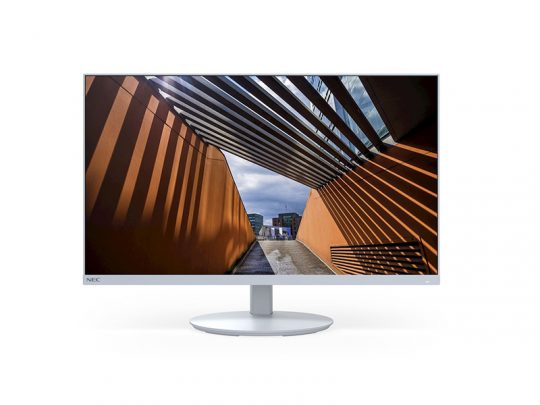 Computer monitor displaying an architectural photograph of a modern walkway with bright orange walls and a slatted roof, creating bold linear shadows; cloudy sky is visible in the background. Perfect for digital art lovers or interior designers seeking contemporary architecture inspiration.
