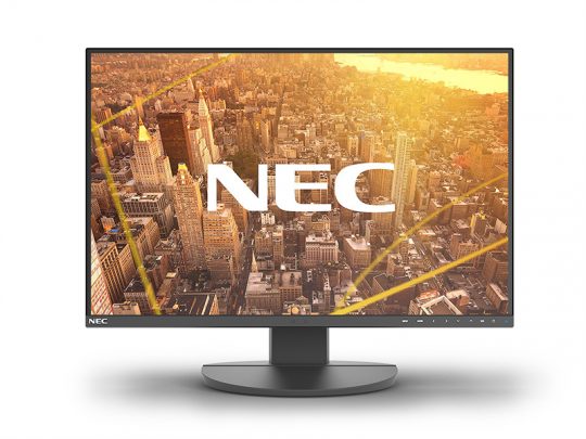 NEC computer monitor with thin black bezel and round stand displays an aerial city skyline on screen, featuring prominent NEC branding. Perfect for modern office or home workspace setups.