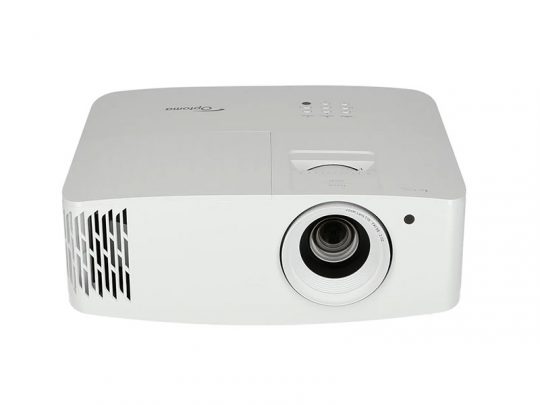 Optoma white projector with central lens, left-side ventilation grilles, and top control buttons. This compact multimedia projector is designed for home or office use, delivering clear image projection with easy-access controls.