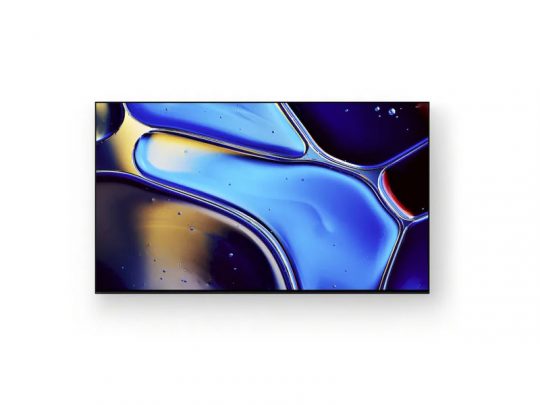 Moderner Flachbildfernseher zum Mieten oder Kaufen zeigt ein abstraktes, farbenfrohes Bild mit fließenden Formen in Blau, Lila, Schwarz und Gold vor weißem Hintergrund. Das Display wirkt hochwertig und elegant - ideal für Heimkino oder Büro.