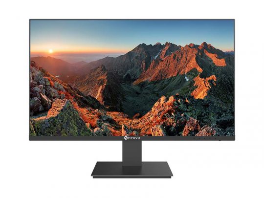 Moderner Computer-Monitor mit dünnem Rahmen und stabilem rechteckigem Standfuß zeigt eine beeindruckende Berglandschaft bei Sonnenuntergang - Sonnenlicht beleuchtet die Felsen und Täler. Ideal als Bildschirm für Büro oder Homeoffice.