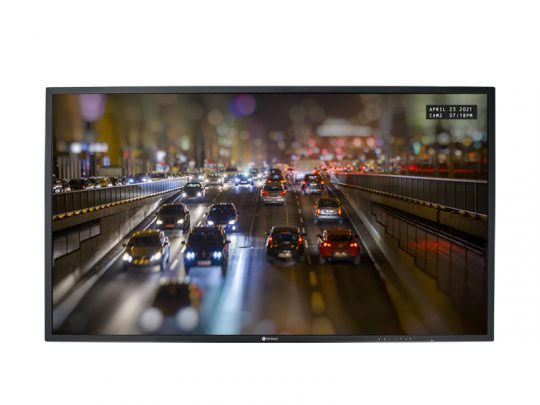 Widescreen-Monitor zeigt verschwommenes Bild von Autos auf einer hell erleuchteten Stadt-Autobahn bei Nacht; eingeblendetes Label oben rechts mit Datum 25. April 2021 und Uhrzeit 19:13 Uhr. Ideal für Sehbehinderte zur Erkennung des Samsung Curved Monitor, geeignet für nächtliche Aufnahmen und Überwachung.